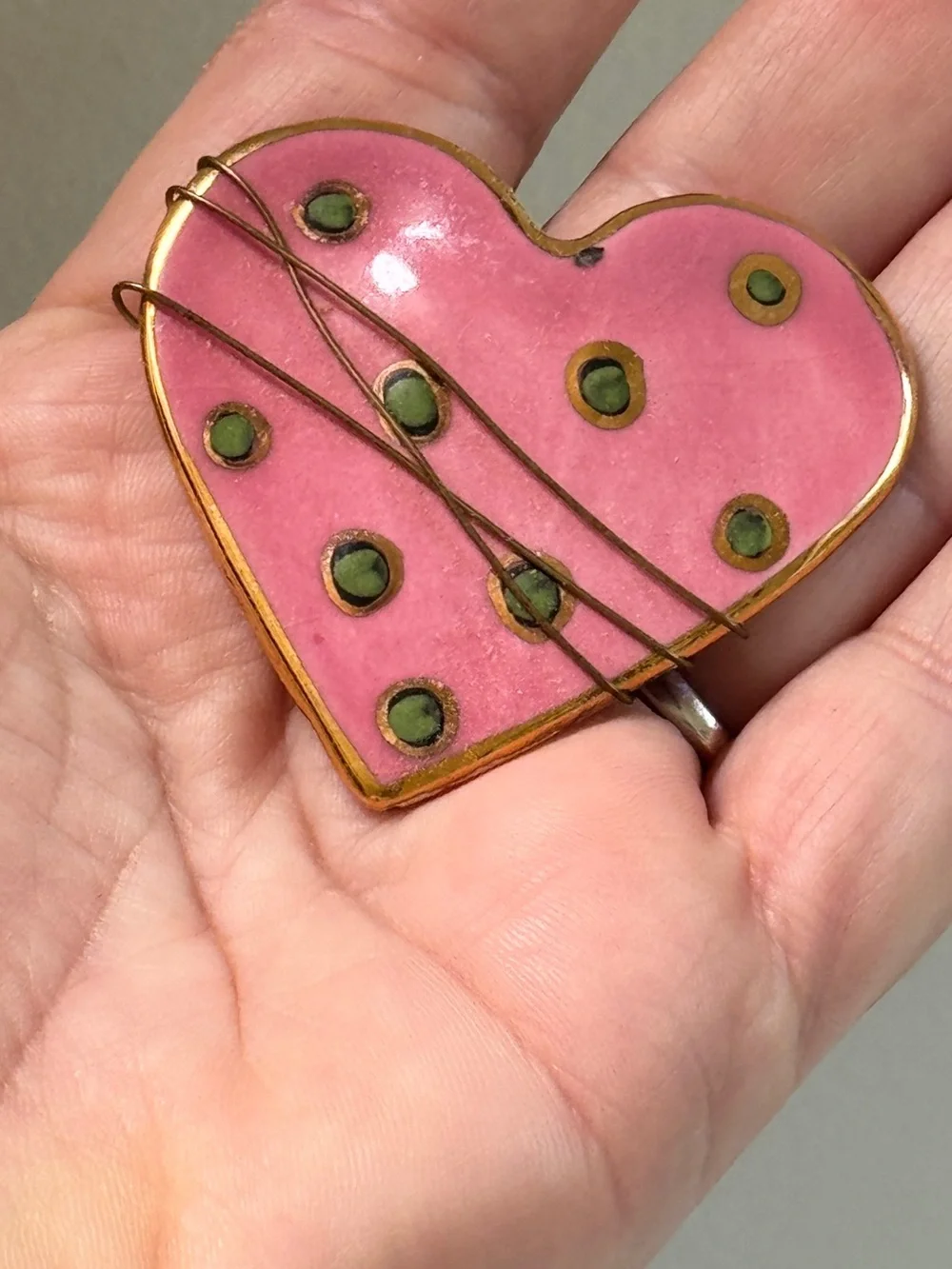 Whimsical Wire Wrapped Pink Heart Enamel Pin with gold trim and Green Dots